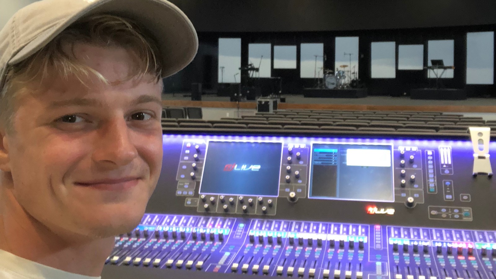Aidan at a sound board