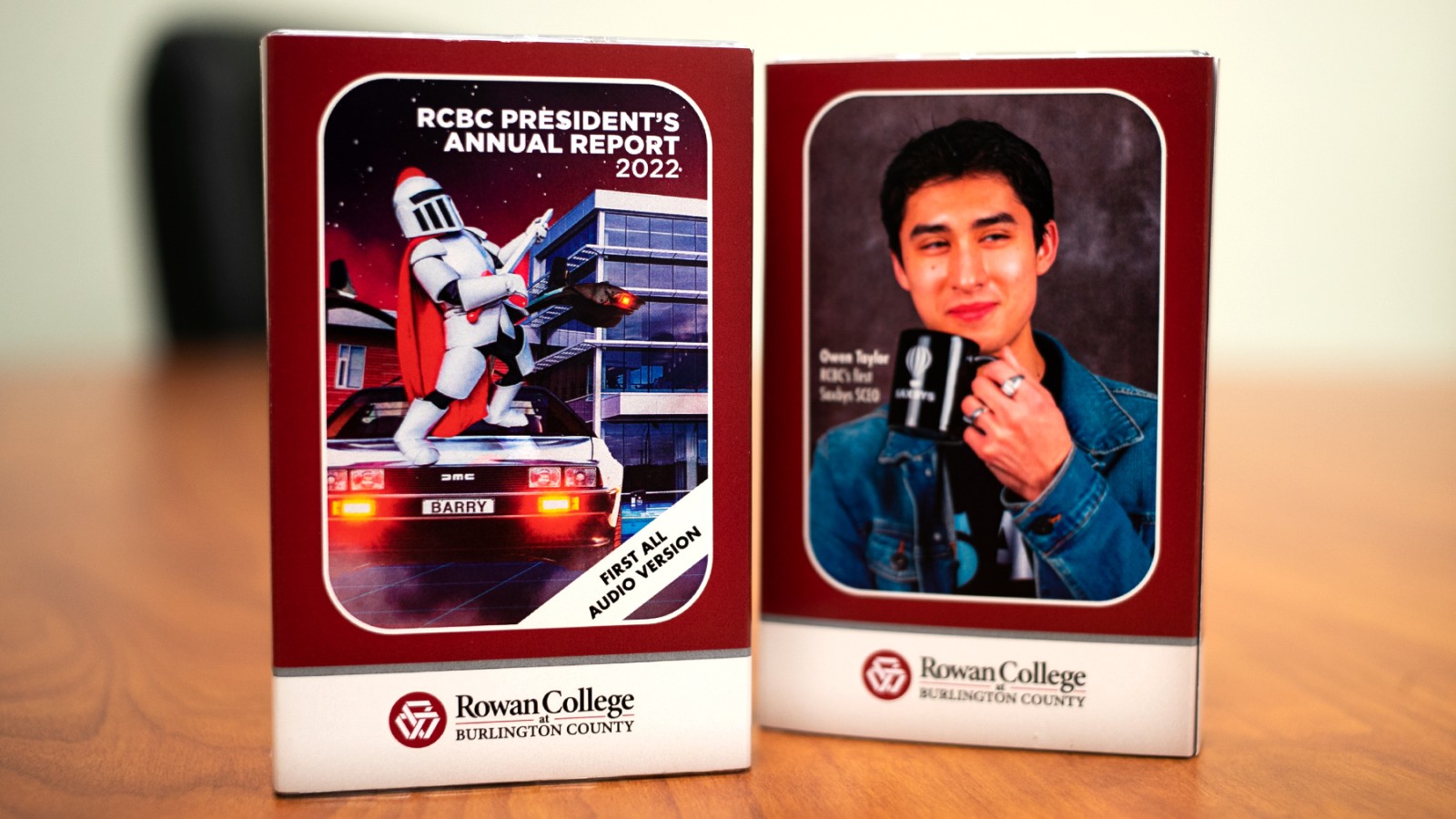Image of audio cassette packaging. Front shows Barry the mascot. Back shows student Owen Taylor.