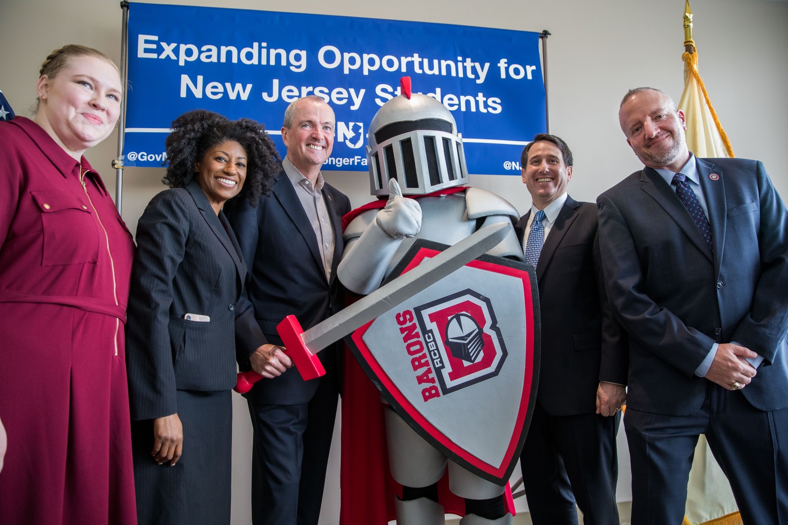 Governor Murphy, Barry, and Dr. Cioce with student and community member